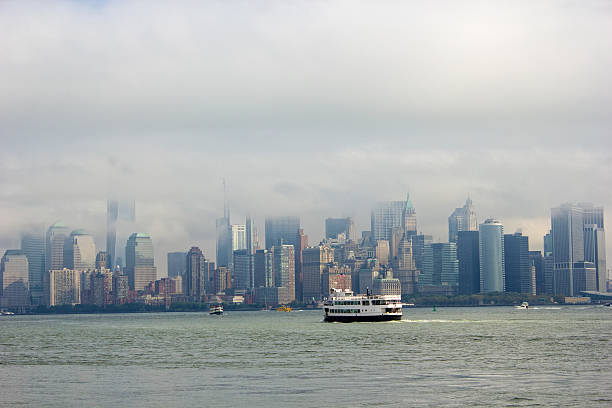 istock Ferry in front of Manhattan on a cloudy day 177529300