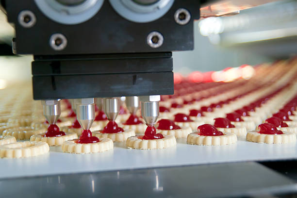 cookie de produção na fábrica - indústria de comidas e bebidas - fotografias e filmes do acervo