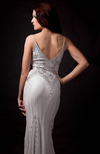 istock brunette in long dress 177530251