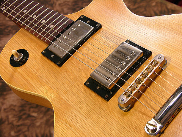 electric wood guitar (angled) stock photo