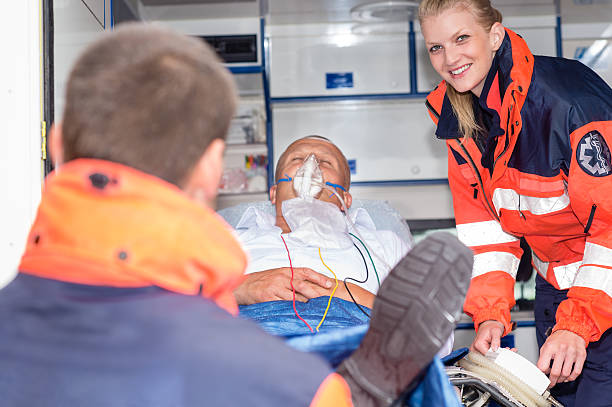 istock Patient in ambulance car with paramedics rescue 177530754