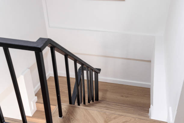 istock Wood staircase inside contemporary white modern house interior. 1775313963