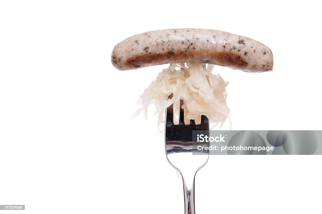 Nuremberger Boudin blanc avec sourcrout sur une fourche - Photo de Boudin blanc libre de droits