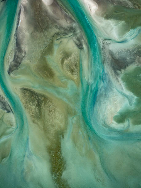 istock Sand and water ripples from above 1775320940