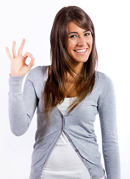 istock Happy young woman doing the ok sign 177532224