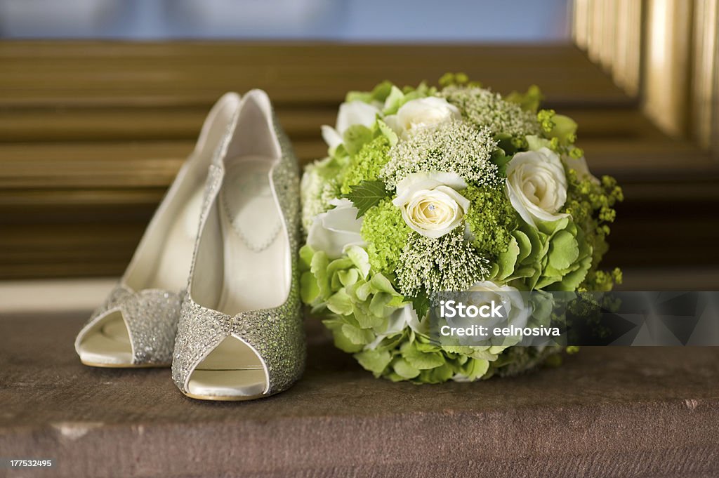 wedding shoes and flowers bouquet wedding shoes and wedding bouquet of white roses Rose - Flower Stock Photo