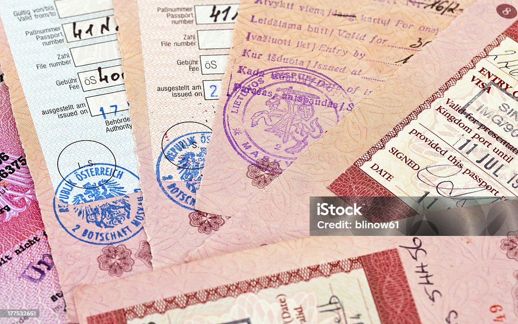 Visa entry and exit stamps in passport Austria Stock Photo