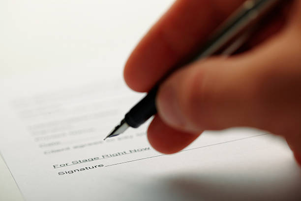 istock Close-up of a man holding pen 177533657