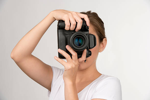 istock Young woman taking a picture 177535640