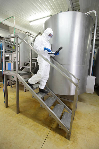 istock scientist focused on tablet walking down the stairs 177536051