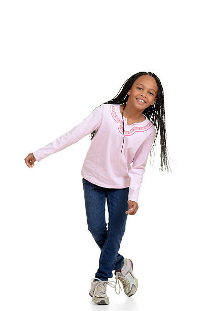 istock Happy young girl child dancing 177536512