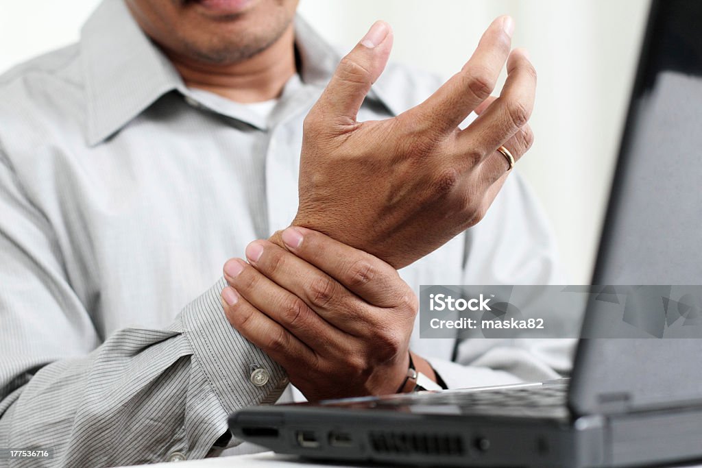 Hand Pain Man with hand pain.Close up. Carpal Tunnel Syndrome Stock Photo