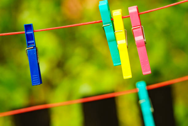 istock Clothes pegs on line outdoor. Housework 1775371230
