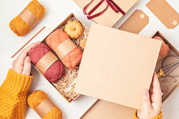 istock Preparing gift box for knitting lovers. Plastic free zero waste care package. Personalized eco friendly basket for family and friends for autumn holidays, christmas, mothers day 1775371243