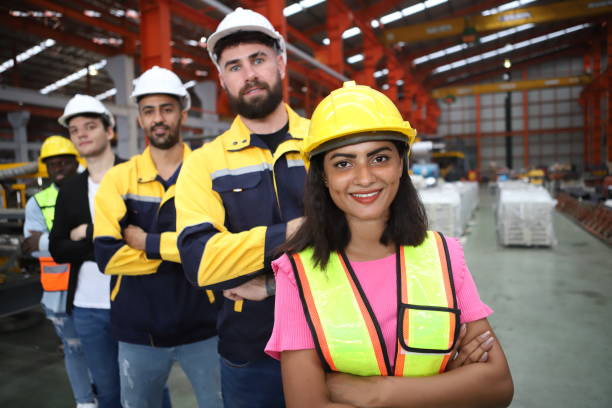 istock engineer team or worker team  with safety uniform standing at industry. 1775372648