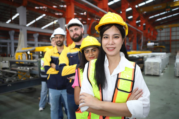 istock engineer team or worker team  with safety uniform standing at industry. 1775372652