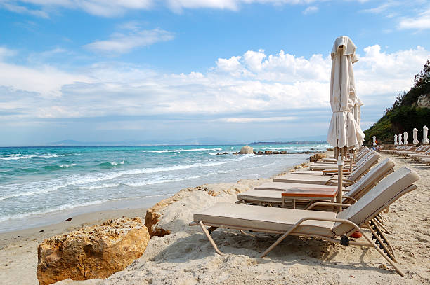 istock Sunbeds on a beach and turquoise water 177537367