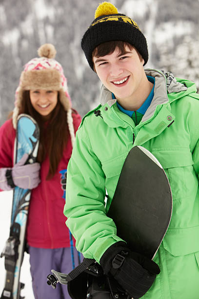 istock Two Teenagers On Ski Holiday In Mountains 177537377