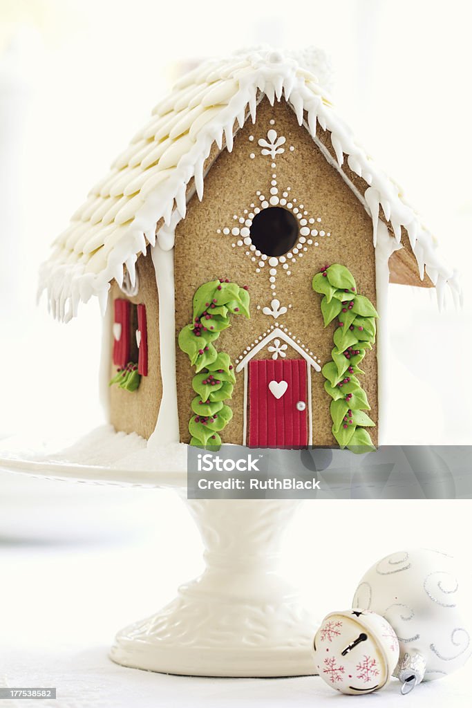 Gingerbread house Gingerbread house on a cakestandMore from my portfolio - Baked Stock Photo