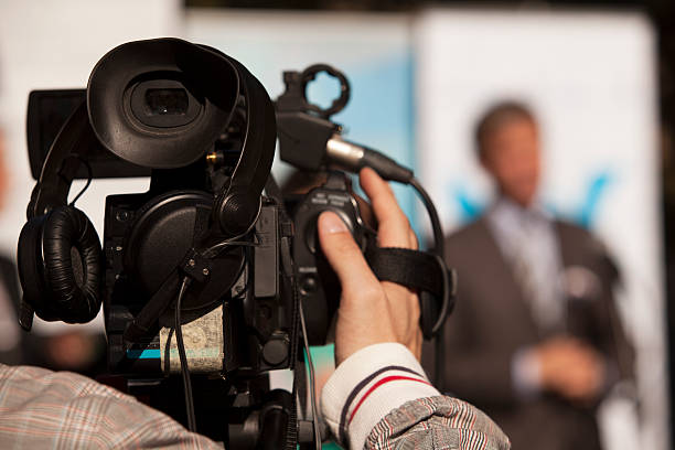 istock Covering an event with a video camera 177538589