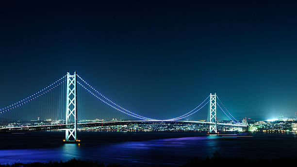 mare interno di seto a notte - kobe bridge japan suspension bridge foto e immagini stock