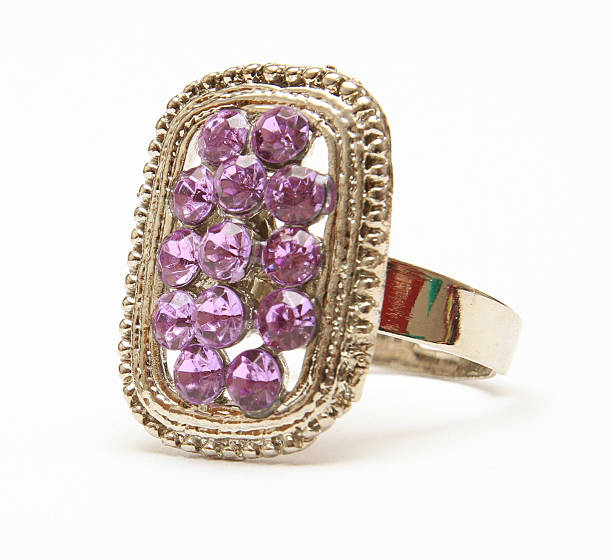 istock Purple Rhinestone ring on white background gems 177538684