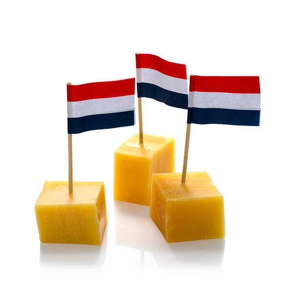 オランダ産チーズキューブ白で分離 - dutch cheese 写真 ストックフォトと画像