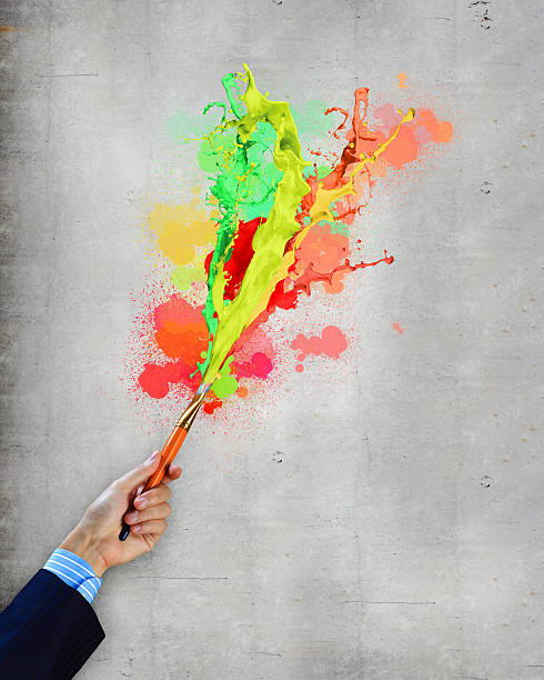 istock Human hand holding paint brush 177538922