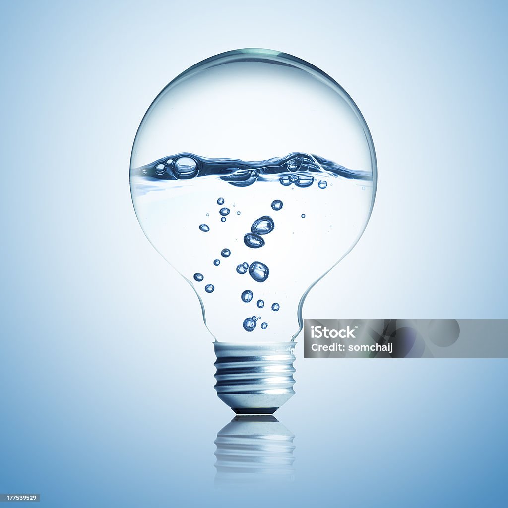 Light Bulb with water inside Light Bulb with water inside. Concept for environmental conservation Light Bulb Stock Photo