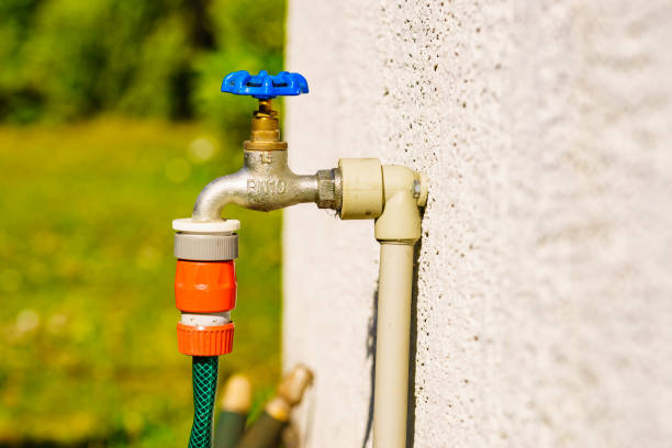 istock Garden tap with hosepipe attached. 1775402313
