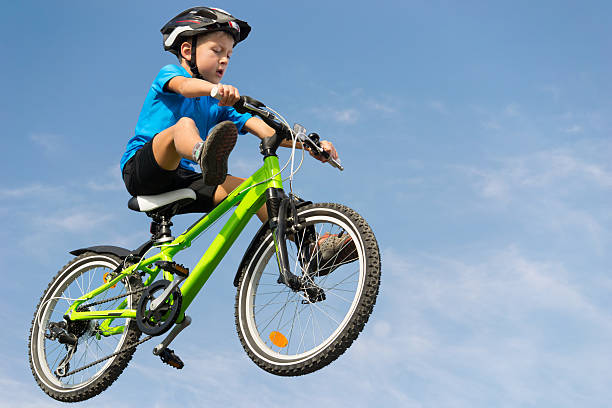 istock Boy jumping on bike 177540355