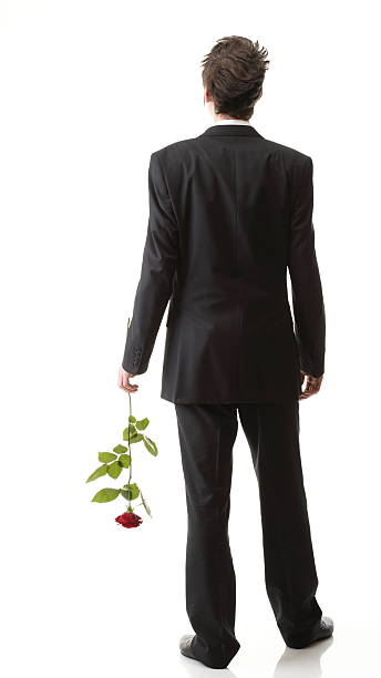 istock Young man, flower, red rose isolated 177540740