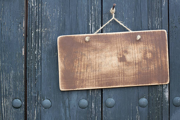 istock Brown wooden frame blank hanging on nail 177540880
