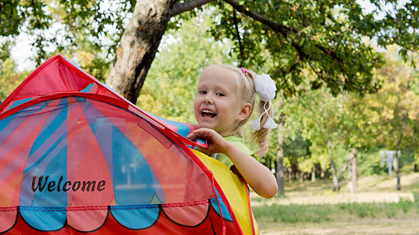 istock Laughing little girl with tent 177542118