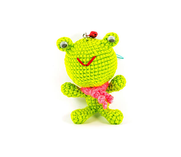 istock handmade crochet green frog doll on white background 177542806