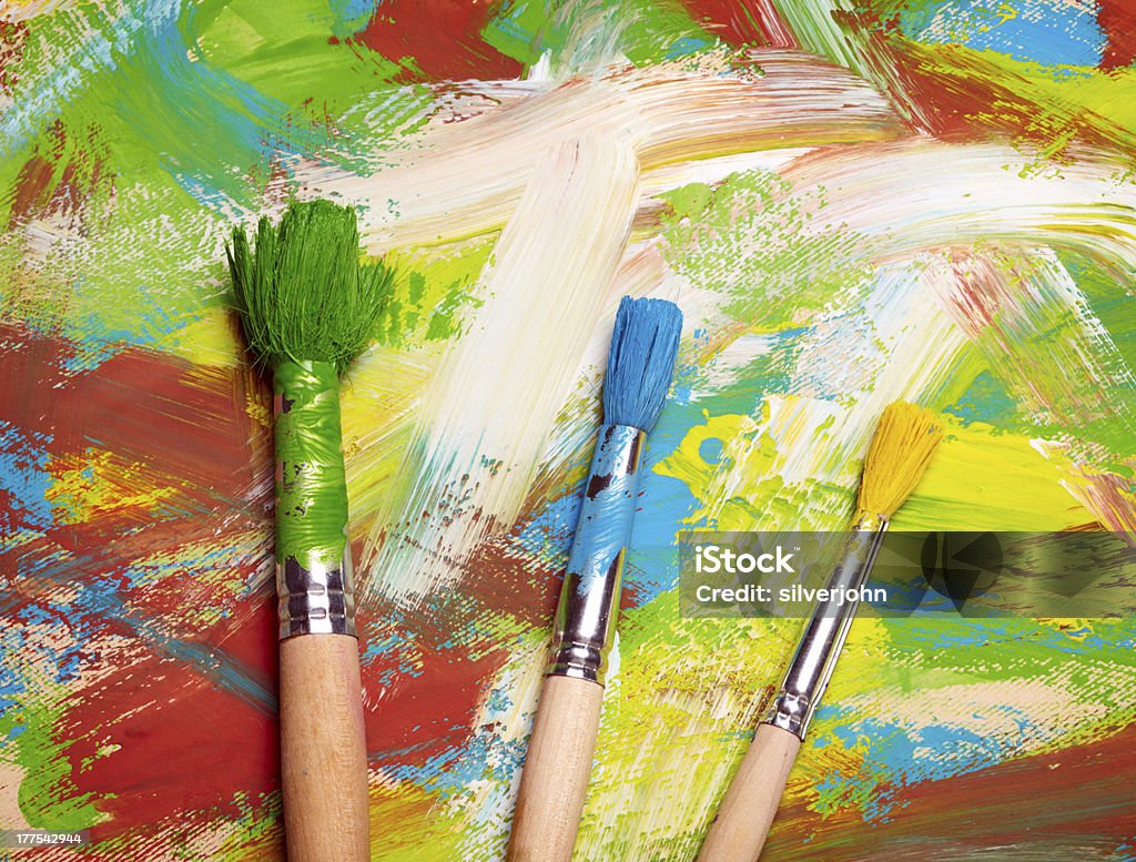 Paintbrushes em fundo abstrato grange - Foto de stock de Abstrato royalty-free