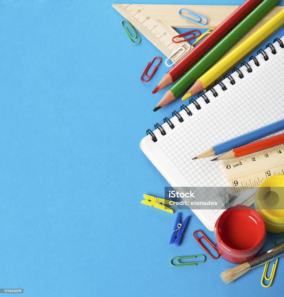 School supplies with copy space Colorful school supplies on the blue background with copy space. Blue Background Stock Photo