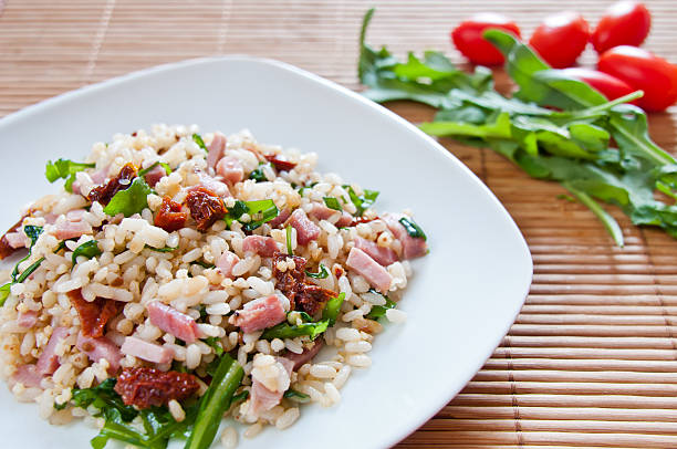 istock Rice Salad with Sun Dried Tomatoes, Ham and Rucola 177543721