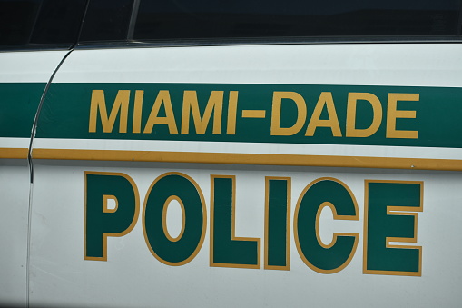 Miami, USA - July 8, 2021: Miami-Dade Police Department's Marked Patrol Car: Symbol of City Vigilance and Law Enforcement