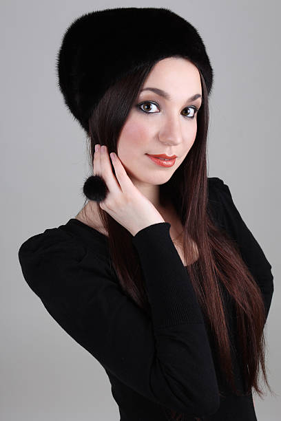 istock Happy woman in black fur hat 177544304