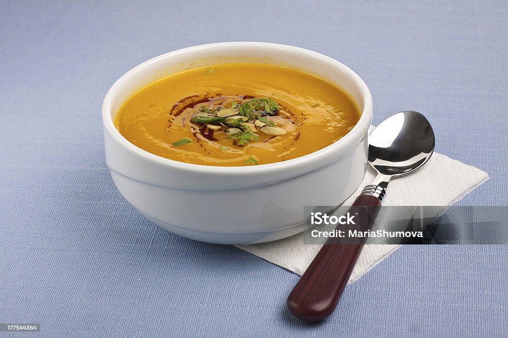 Pumpkin soup Bowl with pumpkin soup Blue Stock Photo