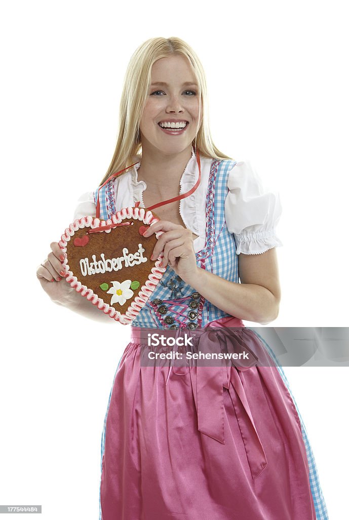 Woman with Lebkuchen Woman with German Lebkuchen heart Adult Stock Photo