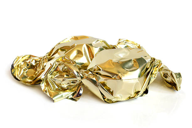istock Chocolate sweets in golden foil 177544619