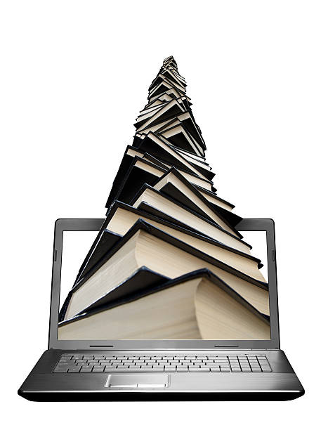 istock Pile of books in laptop 177545140