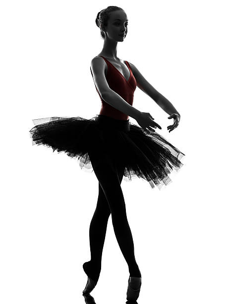 young woman ballerina ballet dancer dancing one caucasian young woman ballerina ballet dancer dancing with tutu in silhouette studio on white background ballerina shadow stock pictures, royalty-free photos & images