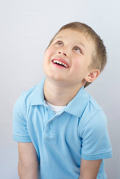 Boy Looking Up Stock Photo - Download Image Now - 6-7 Years, Above