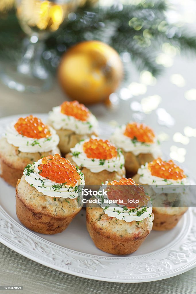 Savoury muffins "Savoury muffins with salmon, caviar and cream cheese, selective focus" Appetizer Stock Photo