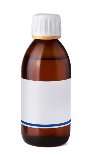 Medicine bottle with blank label isolated on white