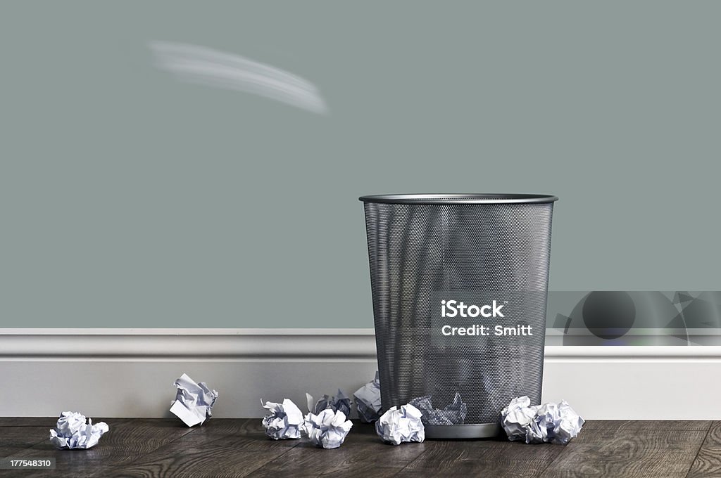 garbage office garbage near metal basket Paper Stock Photo