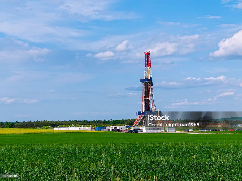 Shale gas pipeline over a field of green Shale gas drilling in the province of Lublin, Poland. Shale Gas Stock Photo